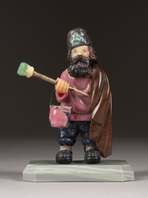 Auction <br>A FINE HARDSTONE FIGURE CARVED AS A PEASANT WITH BUCKET AND BRUSH