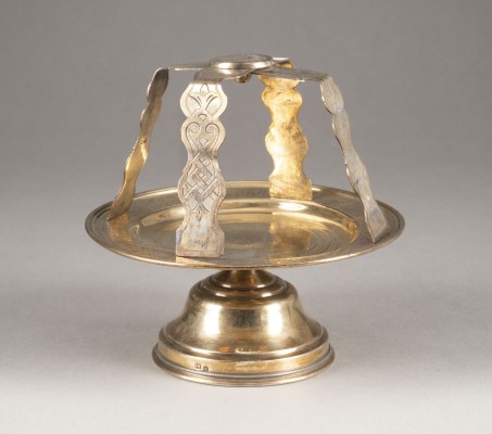 Auction <br>A SILVER-GILT DISKOS SHOWING THE YOUTHFUL CHRIST AND AN ASTERISKOS