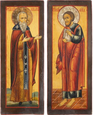 Auction <br>A PAIR OF LARGE ICONS FROM A CHURCH ICONOSTASIS SHOWING ST. LUKE THE EVANGELIST AND A