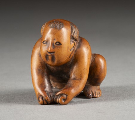 Bild EIN HOLZGESCHNITZTES NETSUKE EINES HOCKENDEN KARAKO