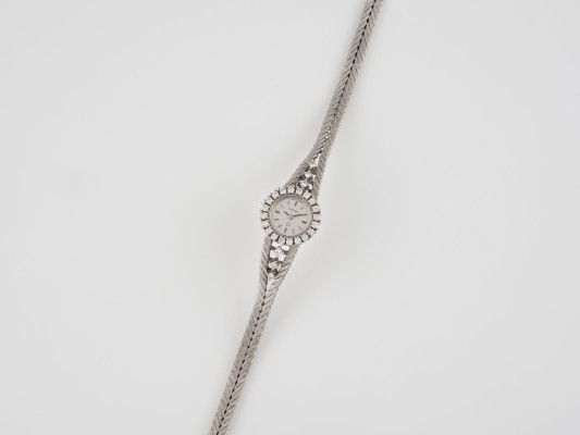Auction 137<br>ARMBANDUHR 'OMEGA' BACKWINDER