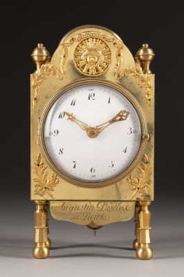 Auction 137<br>SELTENE KOMMODENUHR