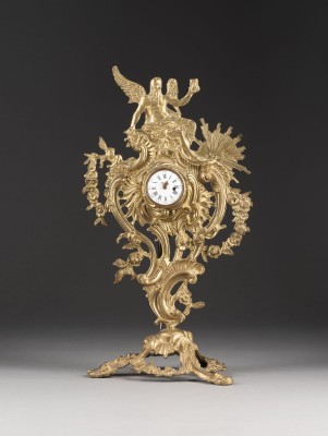 Auction 137<br>TASCHENUHRSTÄNDER MIT 'CHRONOS' UND SPINDELUHR