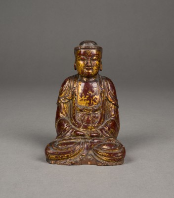Auktion 143<br>EINE GOLDLACKIERTE HOLZFIGUR DES SITZENDEN BUDDHA
