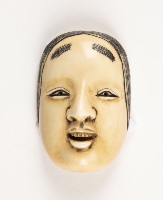 Auction 143<br>EIN AUS ELFENBEIN GESCHNITZTES NETSUKE EINER NOH-MASKE, KO-OMOTE