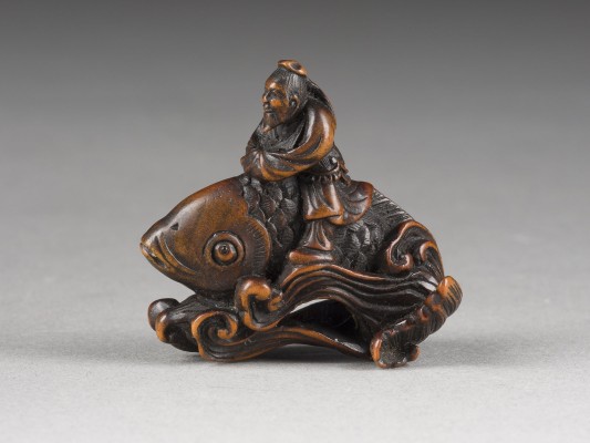 Auction 148<br>EIN NETSUKE VON KINKO AUS HOLZ