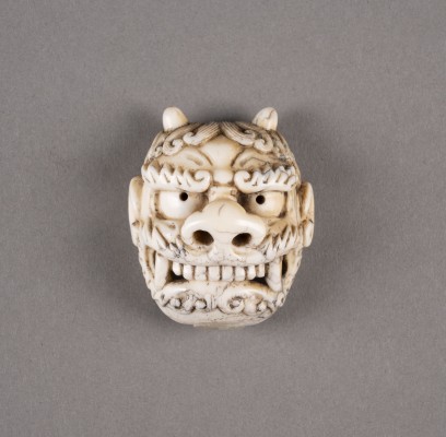 Auktion 152<br>EIN MASKEN-NETSUKE EINES ONI AUS ELFENBEIN