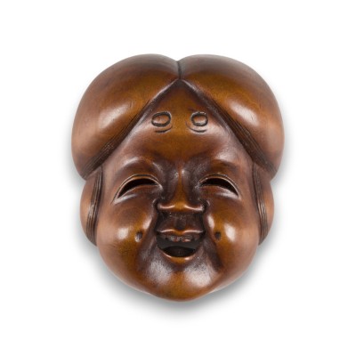 Auction 159<br>EIN NETSUKE IN FORM EINER OKAME AUS HOLZ