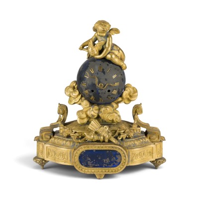Bild PENDULE MIT PUTTO AUF DER WELTKUGEL