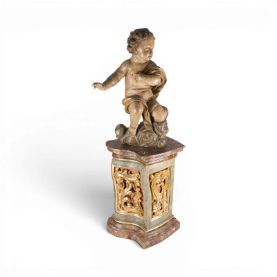 Auktion 160<br>GROSSER SCHWEBENDER PUTTO MIT KONSOLE