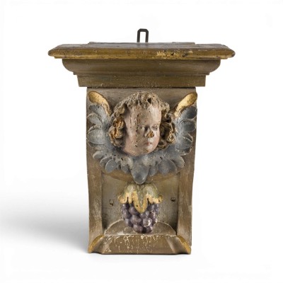 Auction 160<br>WANDKONSOLE MIT GEFLÜGELTEM PUTTOKOPF